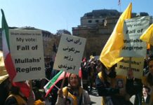 I sostenitori della Resistenza Iraniana partecipano alle manifestazioni del 1° Maggio chiedendo solidarietà per i lavoratori iraniani oppressi